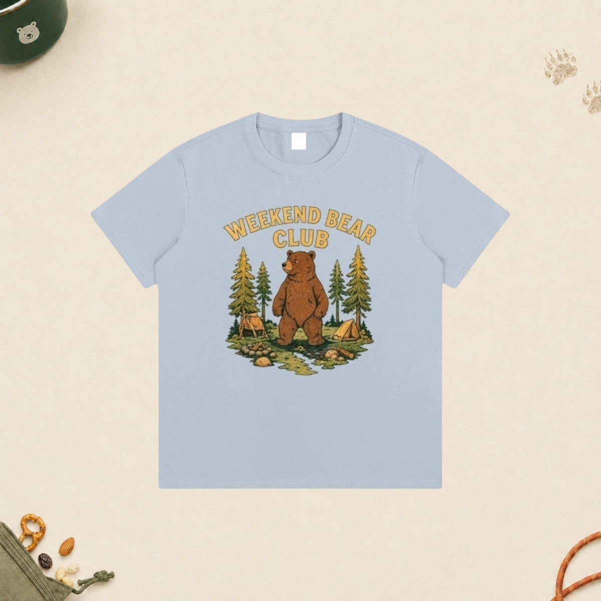 WEEKEND BEAR CLUB | WEEKDAY HUMAN. WEEKEND BEAR. light blue cotton t-shirt with a bear camping graphic print