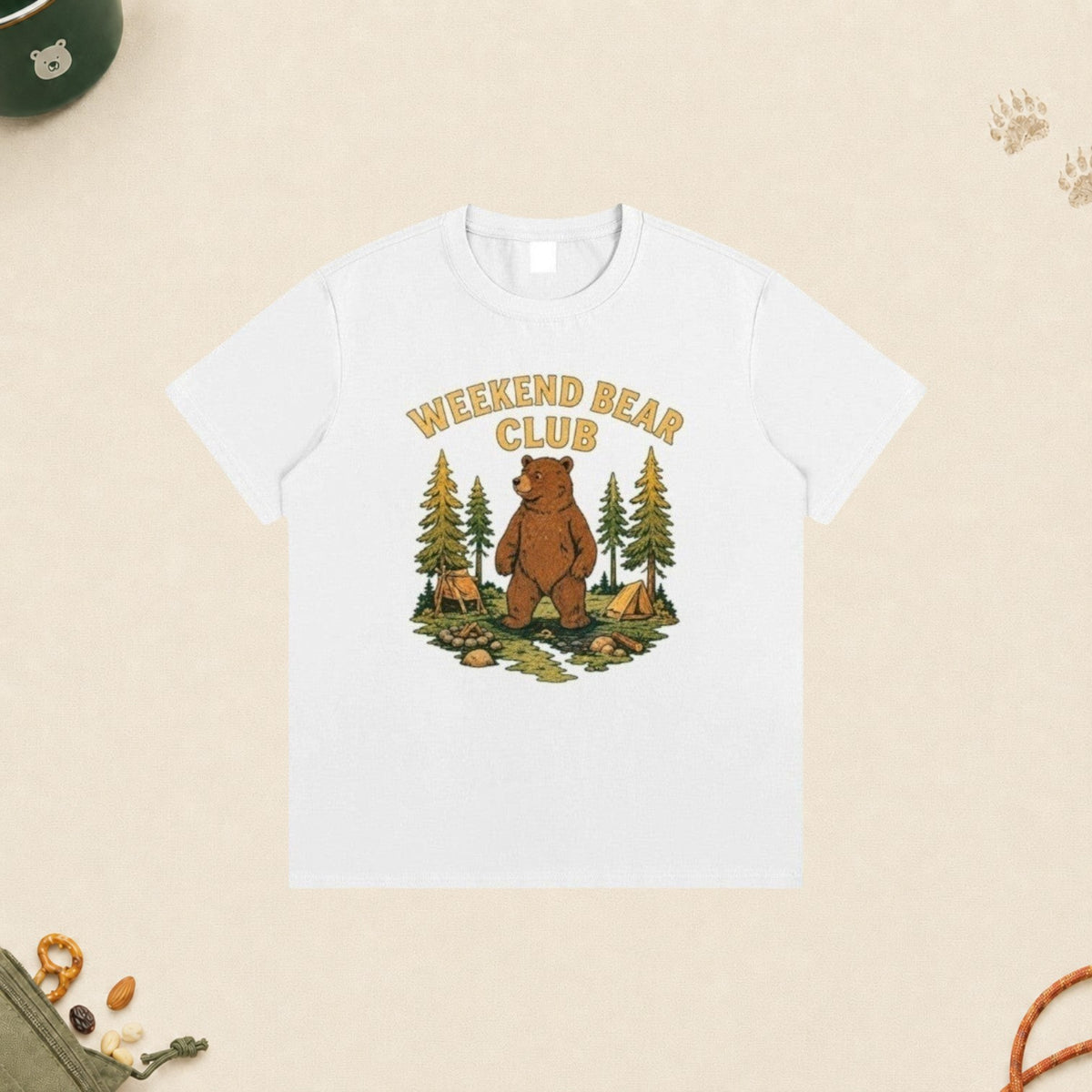 WEEKEND BEAR CLUB | WEEKDAY HUMAN. WEEKEND BEAR. white cotton t-shirt with a graphic of a bear camping in the woods.
